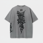 Grey oversized t shirt with angel graphic print and black abstract design for streetwear style