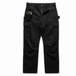 Black construction work pants with reinforced panels and multi pocket utility design for industrial use